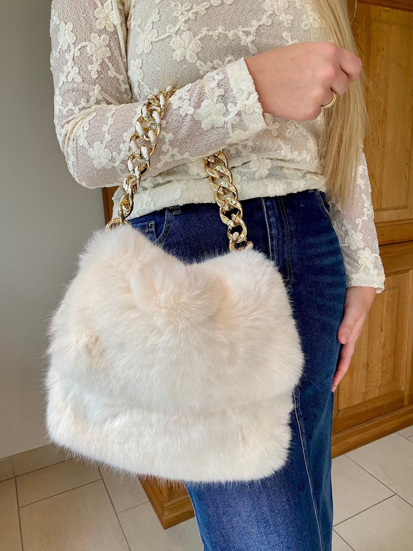 Fur bag with gold chain